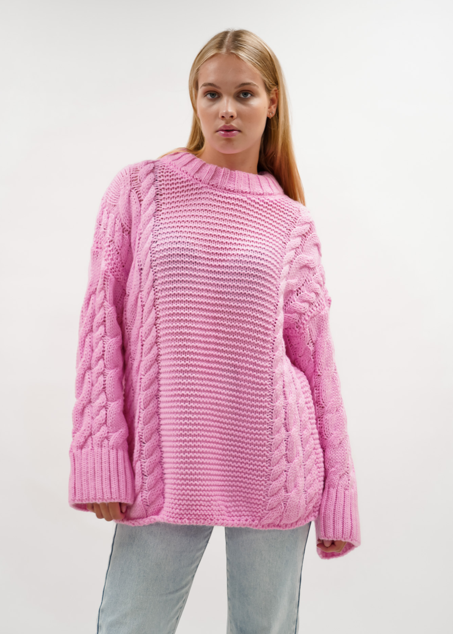 Tricot de câble joli rose