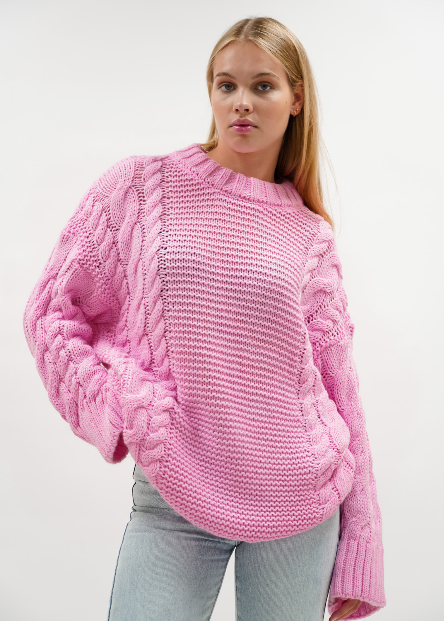 Tricot de câble joli rose