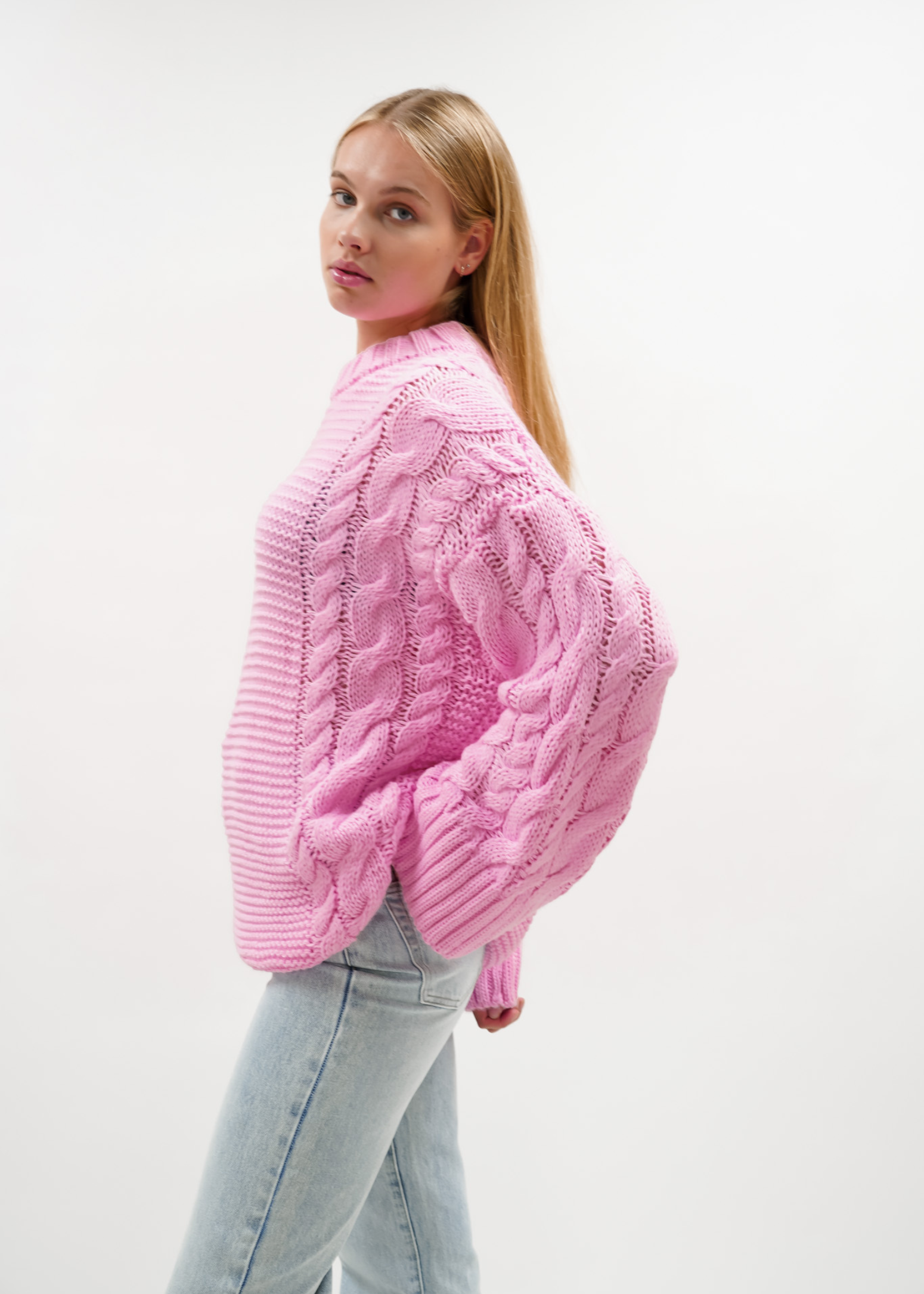 Tricot de câble joli rose