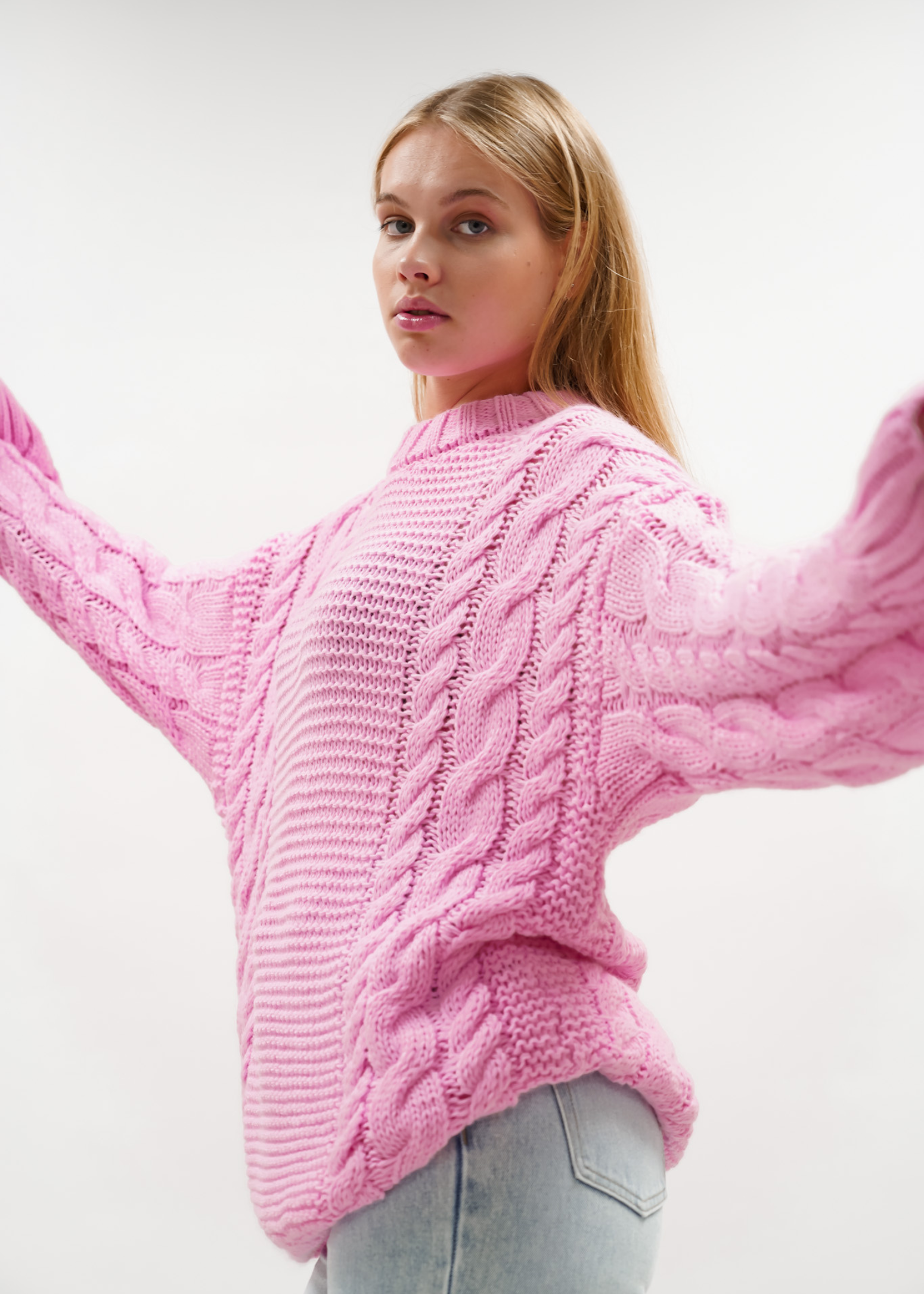Tricot de câble joli rose