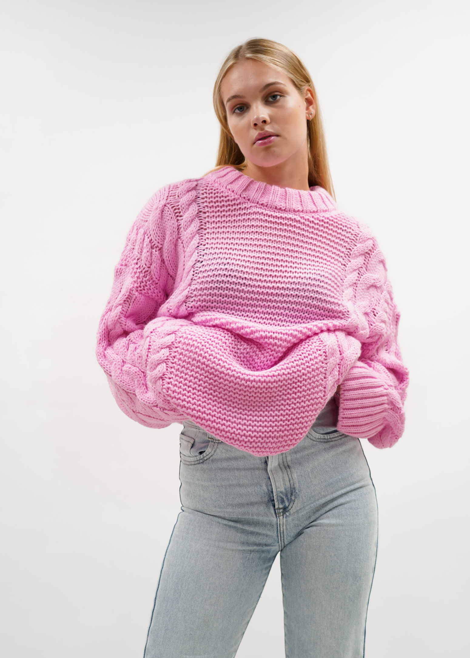 Tricot de câble joli rose