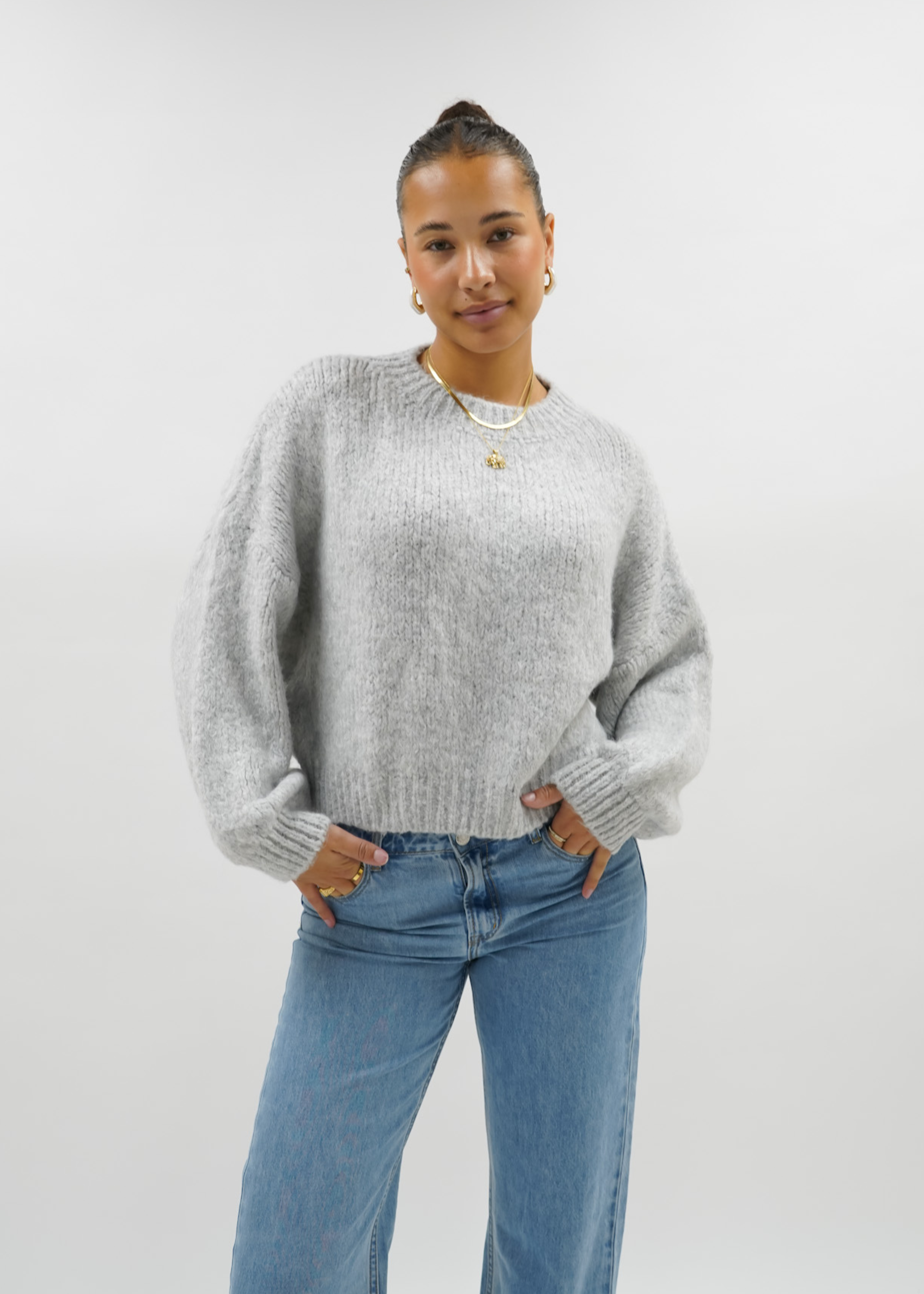 Pull tricoté gris clair