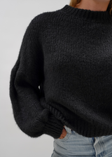 Pull tricoté noir