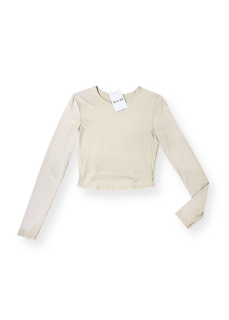Långärm övre beskärt beige.